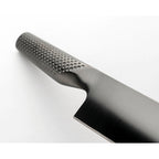 Close-up of a knife with a textured handle on a white background